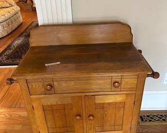 #152 Oak Wash Stand on Wheels w/1 drawer & 2 doors & Shelf w/side Towel Rack - (crack on Top - 31x17x36 $135.00