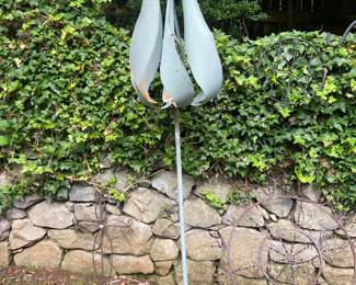 #238 metal spinning flower stand 5.5 tall $65.00