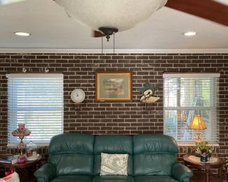 Lazy boy double reclining couch and matching end tables.