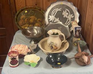 Vintage platters, carved coconut, and pottery pieces.