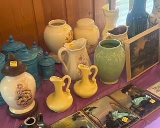 Collectable canaster sets, vases, green McCoy vase, and reversed painted pictures.