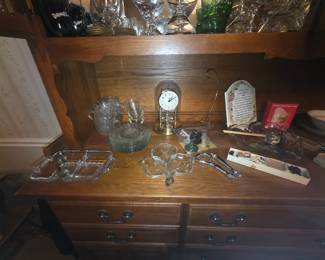 Items in and on China cabinet includes set of plates & cups, divided serving dishes, clock, and more
