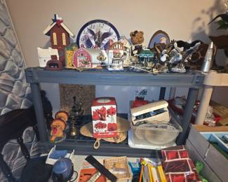 Collectibles including clock, eagles, barn, turkeys, brass, and much more!