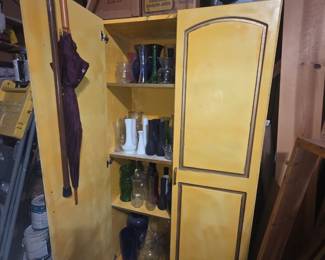 Garage - Cabinet is full of vases