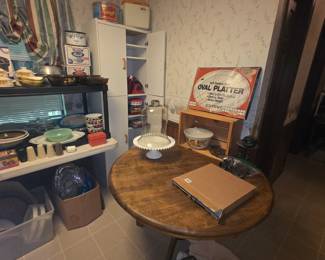 Kitchen - more items including wooden cabinet with doors, oval platter in box, other miscellaneous items on pedestal table
