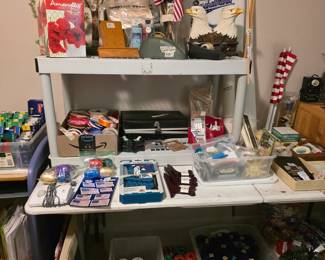 Flags galore, ribbons in all colors-sizes, lights, briefcase, more wrapping paper, tape & tape dispensers, eagles, and MORE!