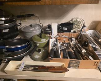 Kitchen - more pots, most with lids - various kitchen tools, knives etc