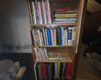 Bookcase with cookbooks and magazines