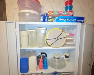 Cabinet with Plastic items, some Tupperware, coffee pots and more