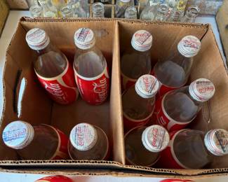 WONDERFUL COLLECTION OF VINTAGE SODA BOTTLES AND CRATES.