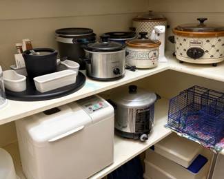 LOTS OF CROCK POTS AND MORE.