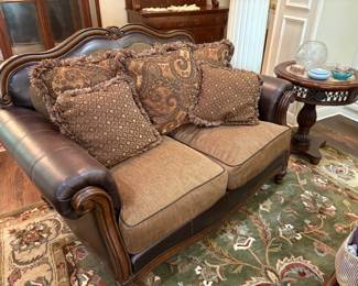 BEAUTIFUL SET OF LEATHER FURNITURE FROM ASHLEY'S. SOFA, LOVE SEAT AND CHAIR WITH OTTOMAN.