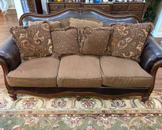 BEAUTIFUL SET OF LEATHER FURNITURE FROM ASHLEY'S. SOFA, LOVE SEAT AND CHAIR WITH OTTOMAN.