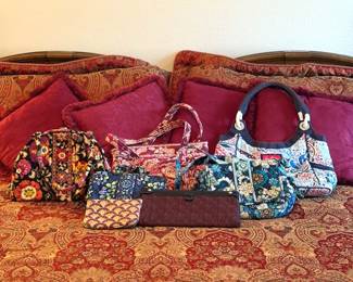VERA BRADLEY PURSES.