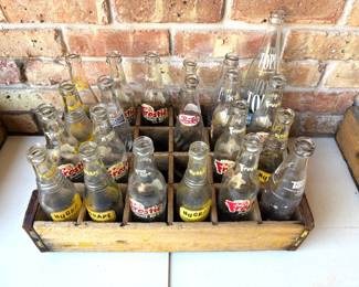 WONDERFUL COLLECTION OF VINTAGE SODA BOTTLES AND CRATES.