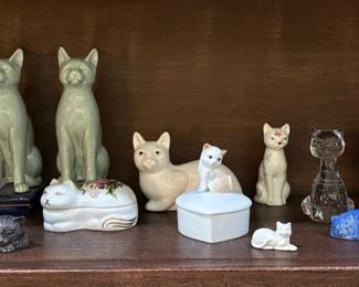 HERE KITTY KITTY. NICE SELECTION OF CAT FIGURINES.