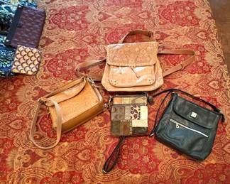 COACH, RELIC, THE SACK AND A CONCEAL CARRY PURSE.