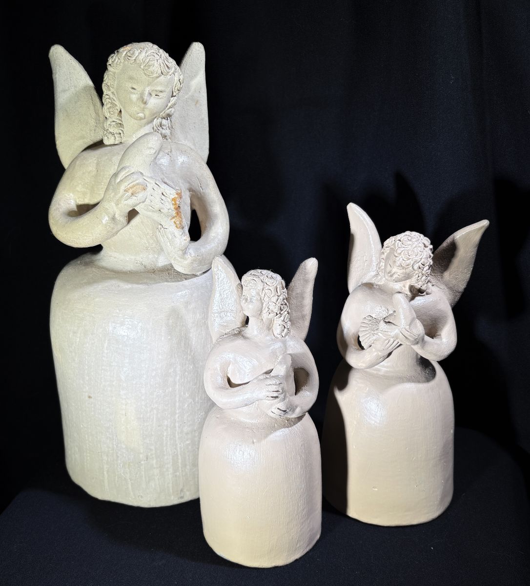 We have lots of pottery this week including these folk art angels…