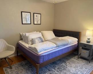 Second Bedroom with a queen upholstered bedframe and mattress