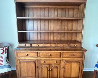 D52 - $550. *Large* Step Back Buffet Cabinet. Solid wood - great construction. Assembled it measures 64.5"W x 18.75"D x 81.75" Tall. Moves in two pieces for easy transport. Top Shelves are fixed. Shelves in the bottom piece are adjustable.