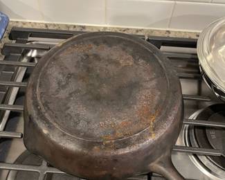 D93 - $25. 10" Cast Iron. (Believed to be Lodge)