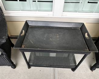 D28 - $100 Set - As is. SEE PHOTOS. Black Wicker Outdoor Set. Two Cushioned Chairs and Rolling Cart Style Table. Wicker is strong and tight. **Under the cushions are torn and need repair! The black paint does have some signs of wear around the arms. Please see photos.