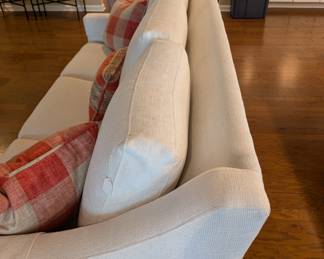D49 - $600. Custom Upholstered Couch. Slightly off white color. Measures 85"W x 36"D x 35"H. Firm but comfy!