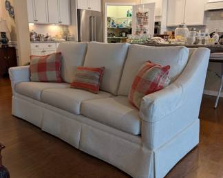 D49 - $600. Custom Upholstered Couch. Slightly off white color. Measures 85"W x 36"D x 35"H. Firm but comfy!