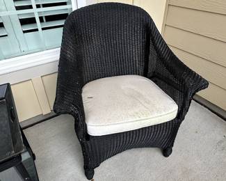 D28 - $100 Set - As is. SEE PHOTOS. Black Wicker Outdoor Set. Two Cushioned Chairs and Rolling Cart Style Table. Wicker is strong and tight. **Under the cushions are torn and need repair! The black paint does have some signs of wear around the arms. Please see photos.