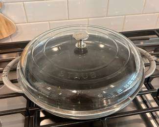 D48 - $75. Staub 11" Round Cast Iron Sauce Pan w / Lid and handles. Like new condition. Well maintained.