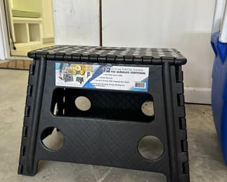 D109 - $5. Folding step stool.