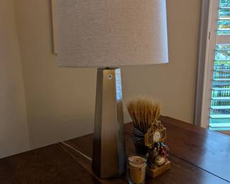 D139 - $25. Gold Table Lamp. Shade is in good condition.
