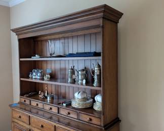 D52 - $550. *Large* Step Back Buffet Cabinet. Solid wood - great construction. Assembled it measures 64.5"W x 18.75"D x 81.75" Tall. Moves in two pieces for easy transport. Top Shelves are fixed. Shelves in the bottom piece are adjustable.