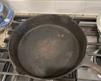 D93 - $25. 10" Cast Iron. (Believed to be Lodge)
