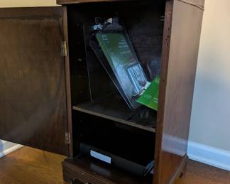 D68 - $95. Small Burl Wood Cabinet (maybe for sheet music but there is only 1 shelf) Measures 15.5" across x 14" deep x 29.5" tall. Has minor trim pieces missing.