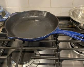 D92 - $35. Le Creuset 10" Cast Iron. Shows signs of use but still in very good condition.