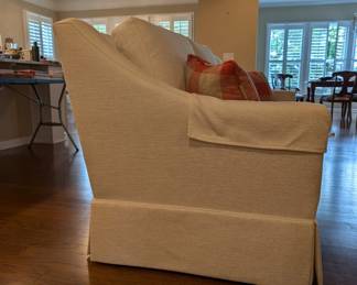 D49 - $600. Custom Upholstered Couch. Slightly off white color. Measures 85"W x 36"D x 35"H. Firm but comfy!