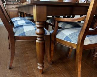 D70 - $950. Ethan Allen 8-Person Dining Table - Farmhouse Style. 2 arm chairs. 6 regular chairs. Measures 90.5 x 41 x 30 (no leaf). Table has some scratches and cosmetic damage, please see photos. Solid & Sturdy!