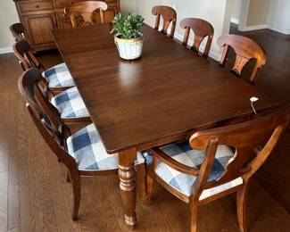 D70 - $950. Ethan Allen 8-Person Dining Table - Farmhouse Style. 2 arm chairs. 6 regular chairs. Measures 90.5 x 41 x 30 (no leaf). Table has some scratches and cosmetic damage, please see photos. Solid & Sturdy!
