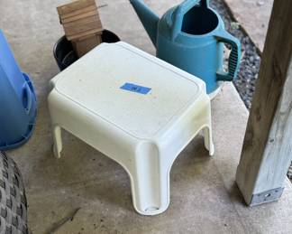 Stool and Plastic Watering Can