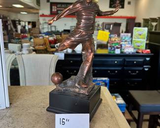 brass statue soccer