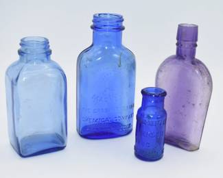 lot of colored glass bottles