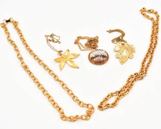 Lot of 4 gold tone necklaces
