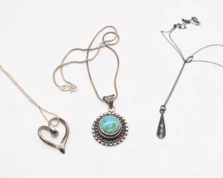 3 Silver tone necklaces