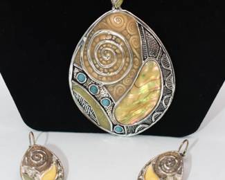 large pendant and earrings
