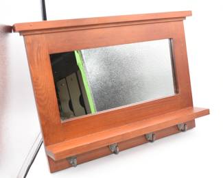 wall hung framed mirror with shelf and hooks