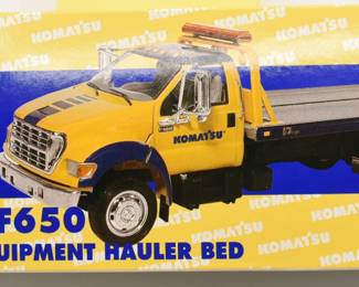 Komatsu Die Cast Metal-Ford F650 with equipment hauler bed 1:34