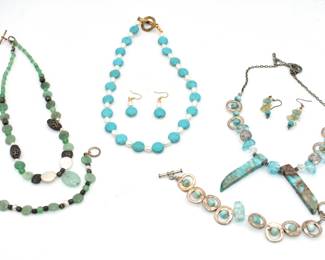 1 necklace/earring set, 1 necklace/bracelet set, and 1 necklace/earring/bracelet set