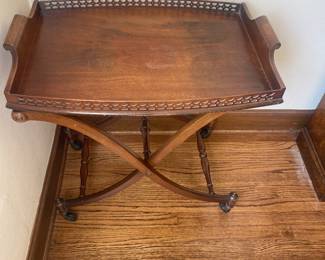 $240 Antique tray table on wheels. Tray is removable. 27”W x 18.5”D x 26.5”H. (As found)