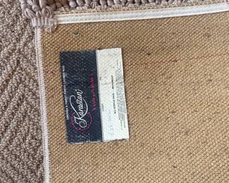 Tag for beige rug